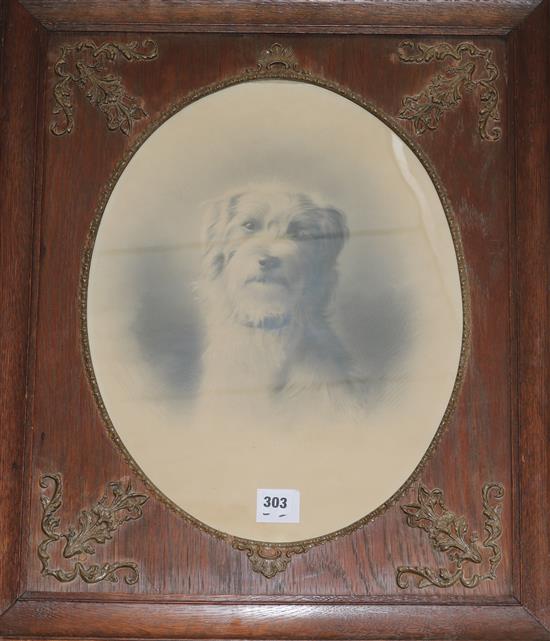 An oak framed portrait of a dog